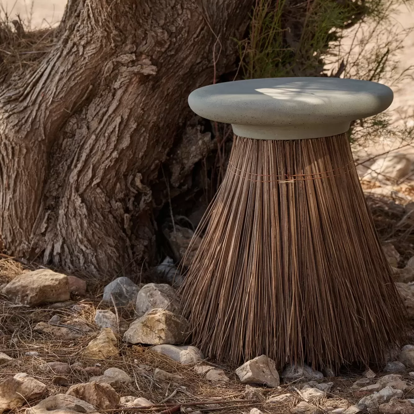 saroma concrete and straw side table by sotirislazou designstudio urbi et orbi
